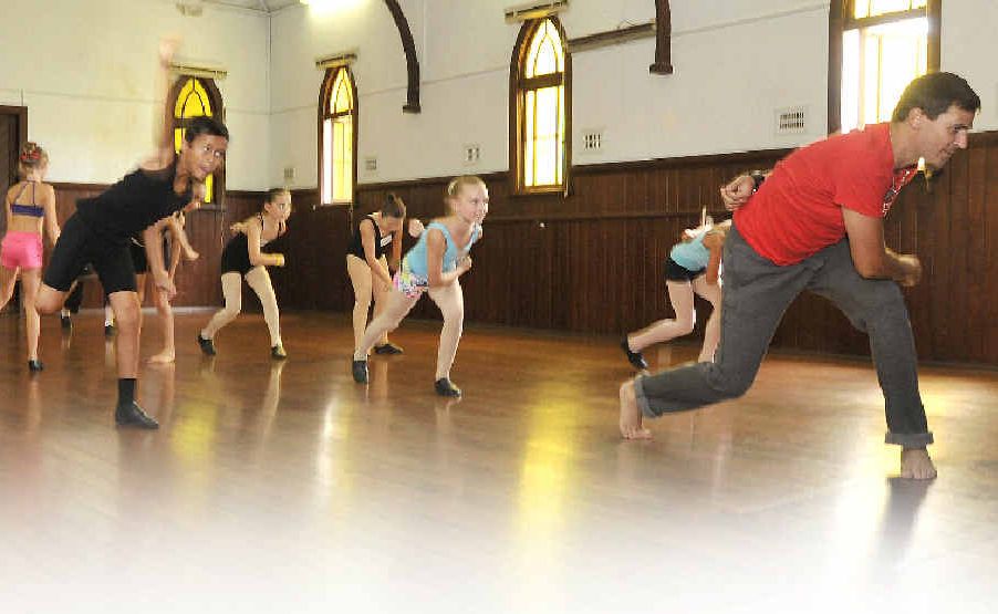 FUN WORKSHOP: Ben Mayne teaching a class at Alstonville Dance Studio (above) and, at left, with young dancers Harmi Davis and Madeline Aspinall. FUN WORKSHOP: Ben Mayne teaching a class at Alstonville Dance Studio (above) and, at left, with young dancers Harmi Davis and Madeline Aspinall.